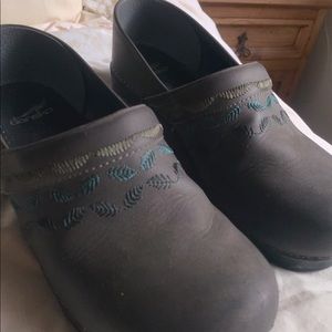 Dansko clogs with colored stitching
